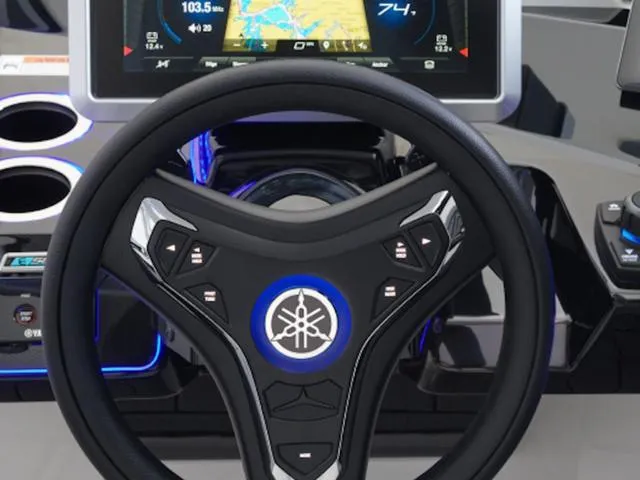 Slide: The Image of Steering wheel and dashboard of 2024 Yamaha Boats 275SD with digital display. - 5