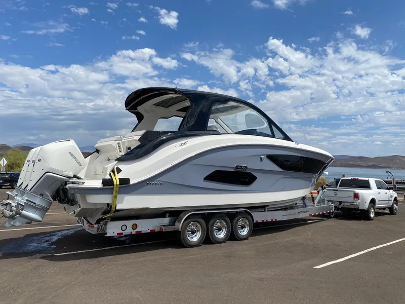 Slide: The Image of 2025 Sea Ray Sundancer 370 OB docked at marina. - 2