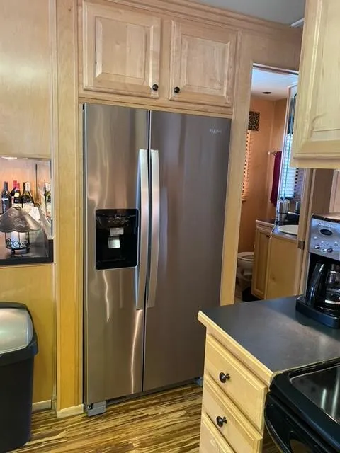 Slide: The Image of Modern kitchen in 2006 Sumerset Houseboat with stainless steel refrigerator. - 11