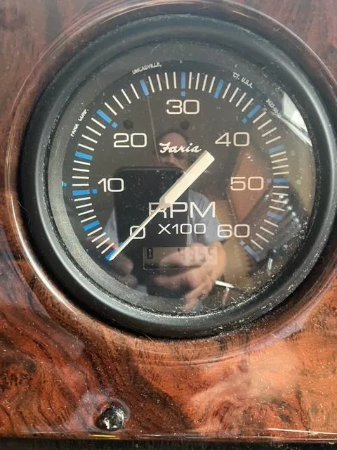 Slide: The Image of Close-up of a 2006 Sumerset Houseboat RPM gauge. - 2