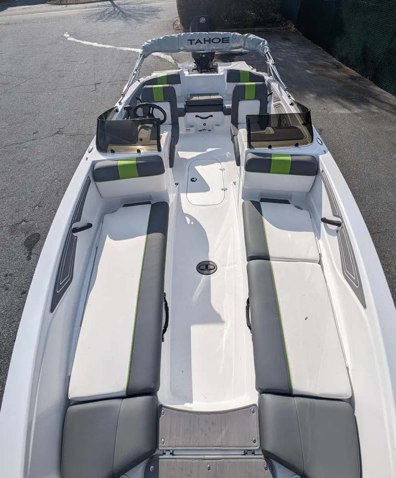 Slide: The Image of 2024 Tahoe T21 boat with spacious seating and modern design. - 13