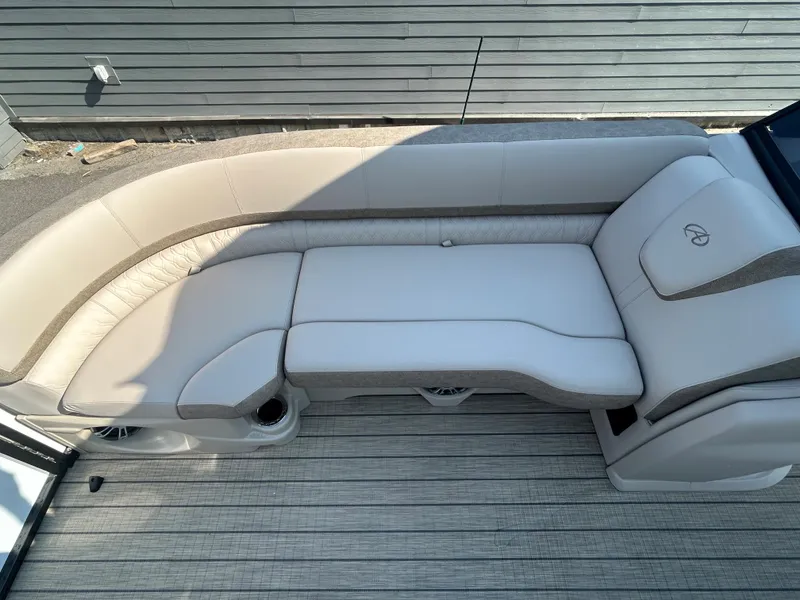 Slide: The Image of 2024 Avalon LSZ 2385 EL boat interior with luxurious beige seating. - 13