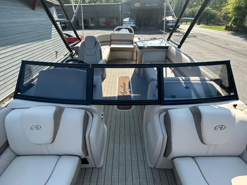 Slide: The Image of 2024 Avalon LSZ 2385 EL pontoon boat interior with luxurious seating. - 14
