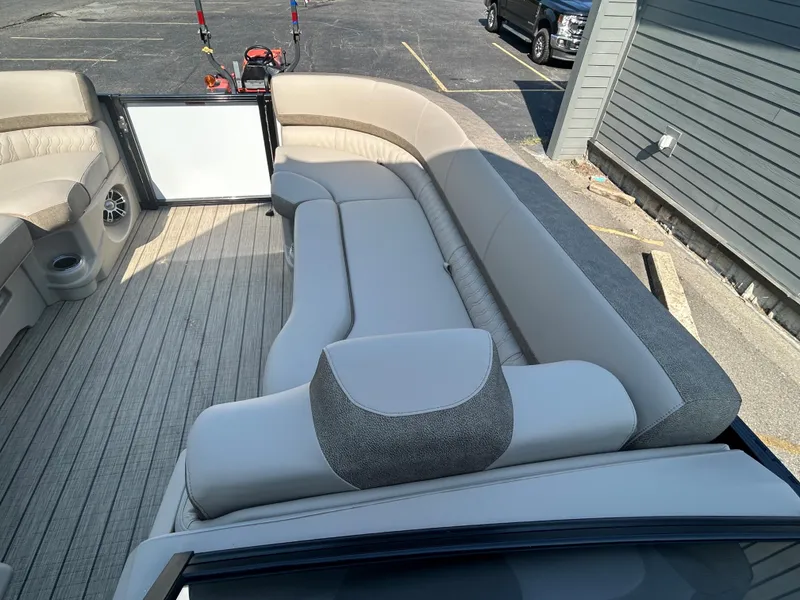 Slide: The Image of 2024 Avalon LSZ 2385 EL pontoon boat with spacious seating and modern design. - 16