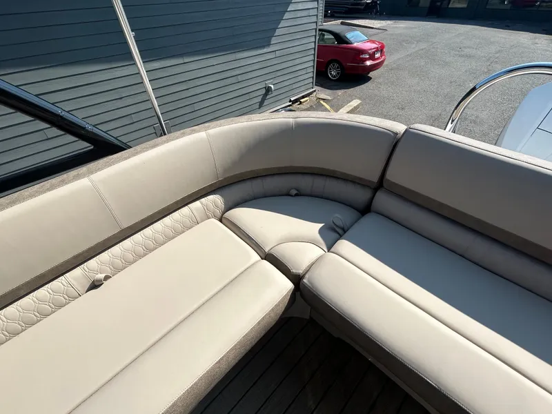 Slide: The Image of 2024 Avalon LSZ 2385 EL boat with beige leather seating. - 23
