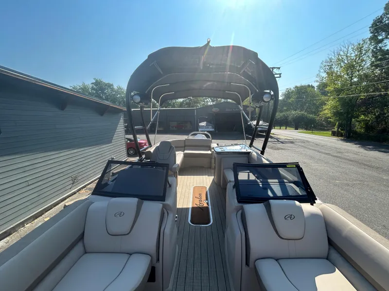 Slide: The Image of 2024 Avalon LSZ 2385 EL pontoon boat with spacious seating and canopy. - 9