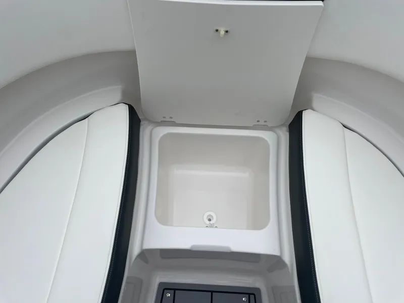 Slide: The Image of 2024 Chaparral 247 SSX boat interior storage compartment. - 21