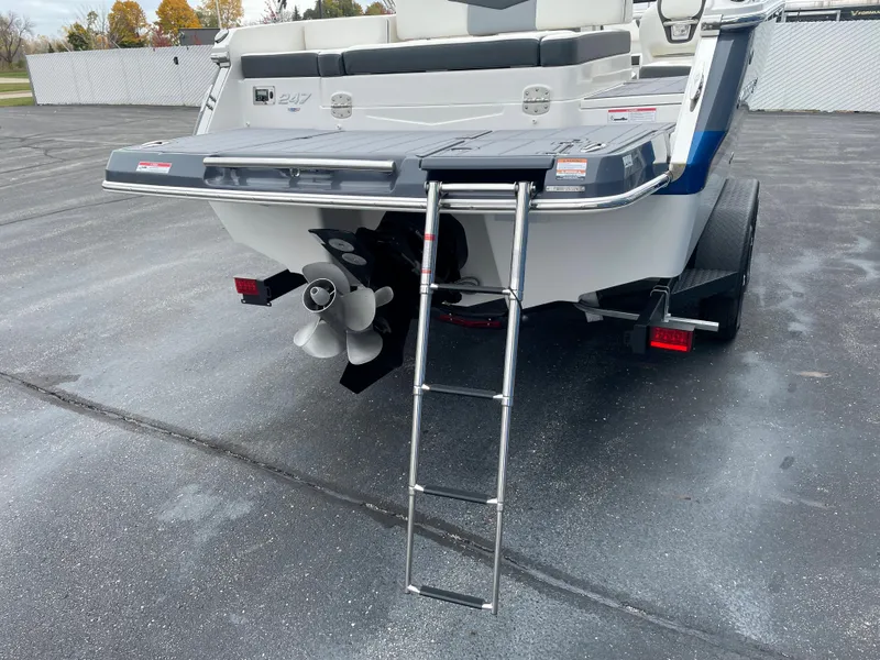Slide: The Image of 2024 Chaparral 247 SSX boat with extended swim platform and ladder. - 26