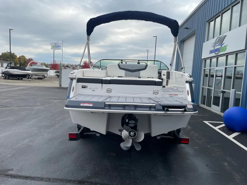 Slide: The Image of 2024 Chaparral 247 SSX boat rear view at dealership. - 3