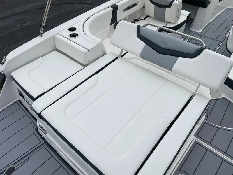 Slide: The Image of 2024 Chaparral 247 SSX boat with luxurious white seating and modern design. - 33