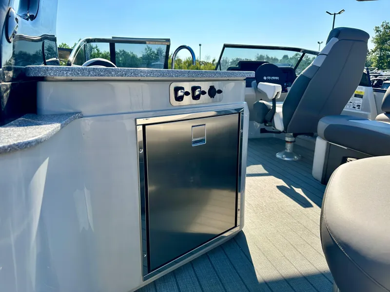 Slide: The Image of 2023 Tahoe Pontoon 27FT Grand Tahoe LTD Elite interior with stainless steel cabinet. - 13