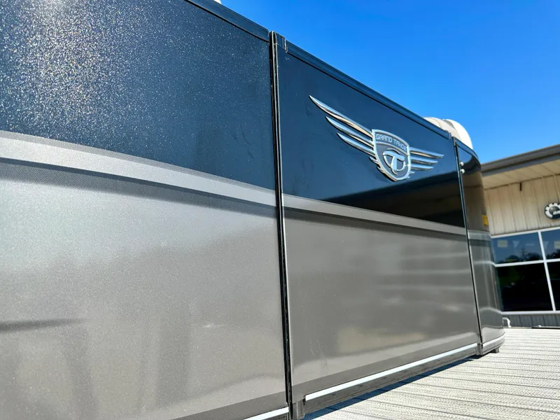 Slide: The Image of 2023 Tahoe Pontoon 27FT Grand Tahoe LTD Elite side view with logo. - 17