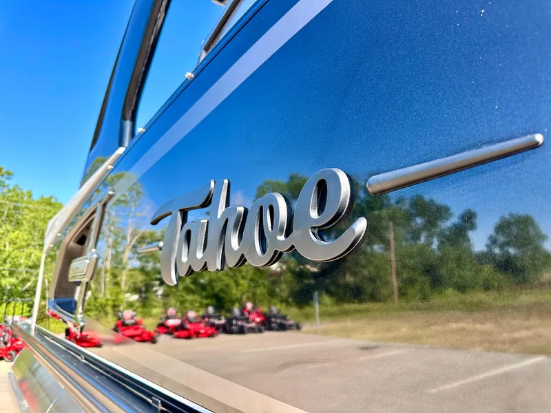Slide: The Image of 2023 Tahoe Pontoon 27FT Grand Tahoe LTD Elite close-up with logo. - 18