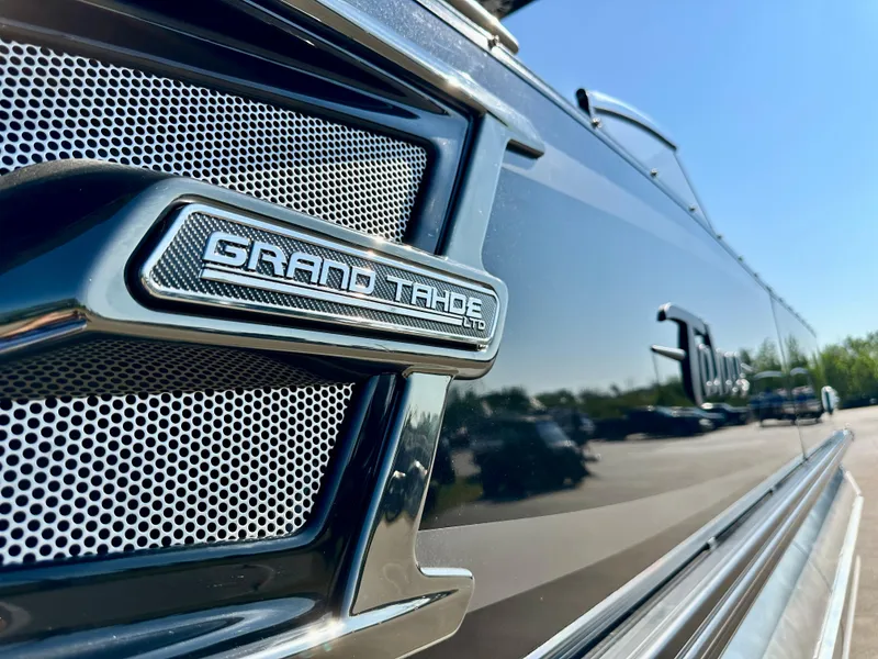 Slide: The Image of Close-up of 2023 Tahoe Pontoon 27FT Grand Tahoe LTD Elite logo. - 19