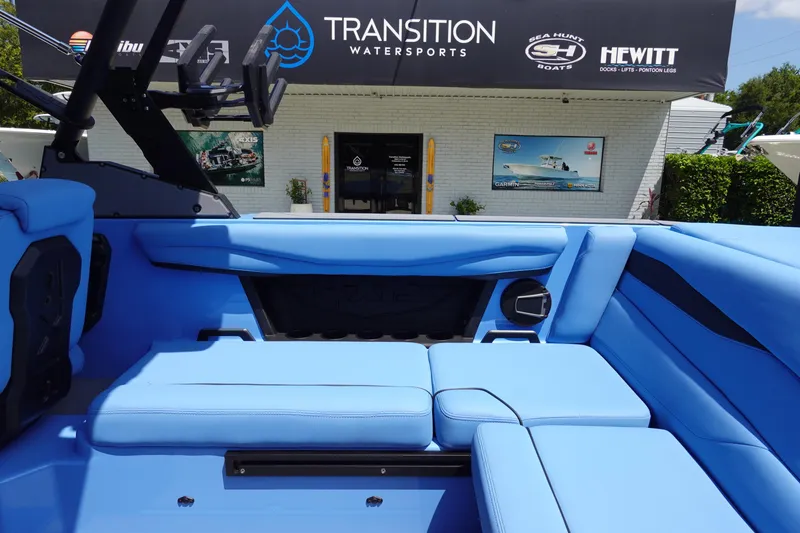 Slide: The Image of 2024 Axis A225 boat with blue interior at Transition Watersports dealership. - 19