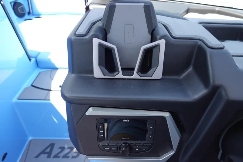 Slide: The Image of Axis A225 2024 boat dashboard with control panel and phone holder. - 25