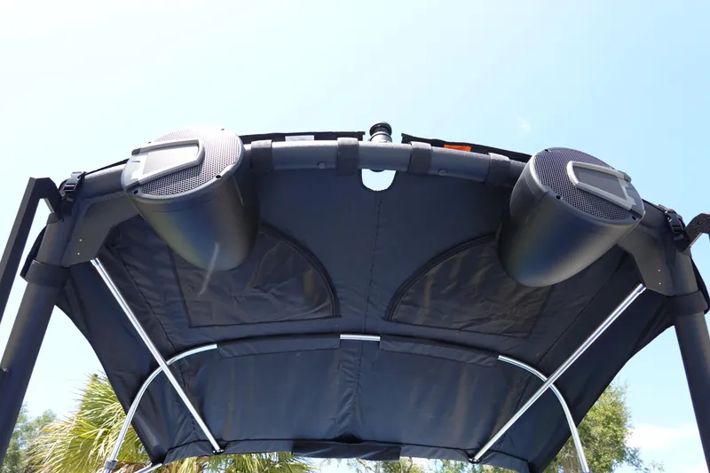 Slide: The Image of 2024 Axis A225 boat with mounted speakers on the canopy. - 33