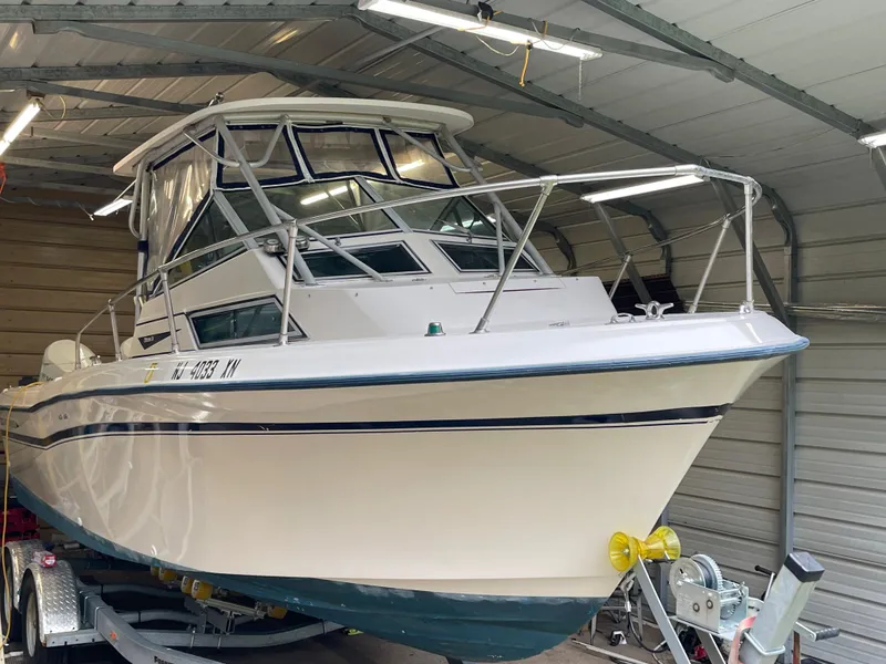 The Image of 1988 Grady-White Offshore boat in a covered storage unit. - 3
