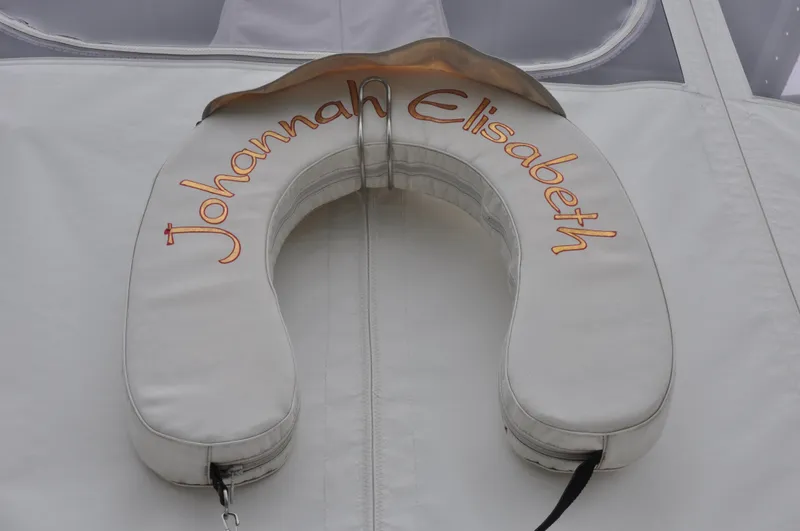Slide: The Image of Life preserver on 1987 Bertram 37 Convertible boat with Johannah Elisabeth text. - 29