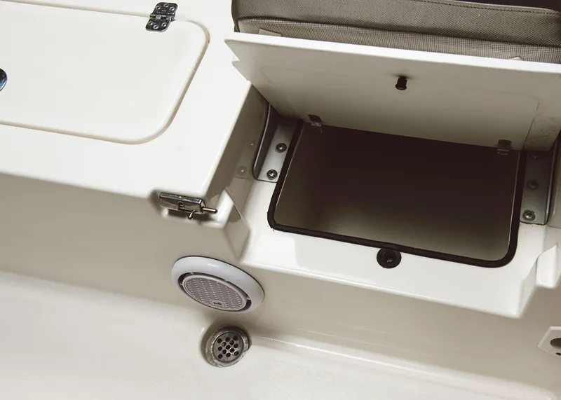 Slide: The Image of 2024 Key West 250 Bay Reef storage compartment and speaker detail - 15