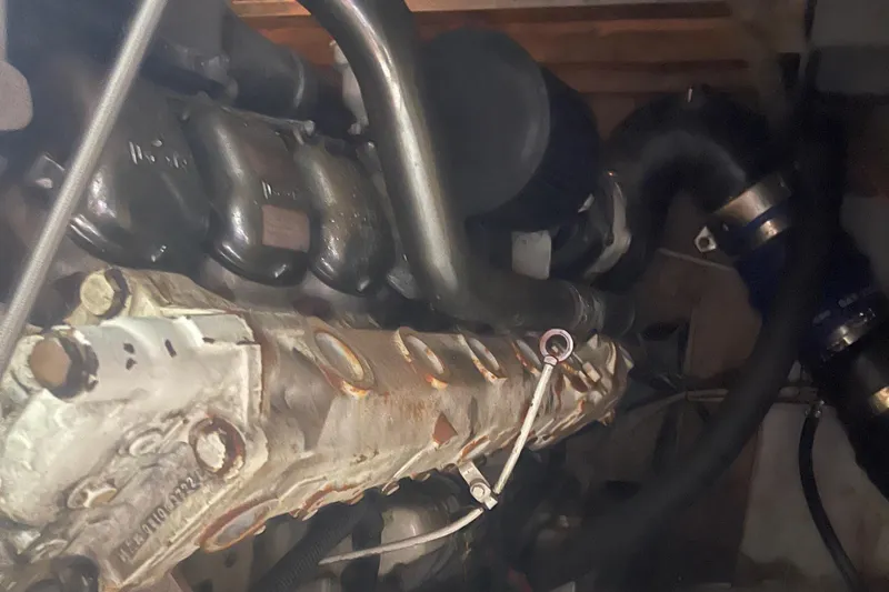 Slide: The Image of Engine compartment of a 2004 Custom Carolina 47 Alex Willis boat. - 27