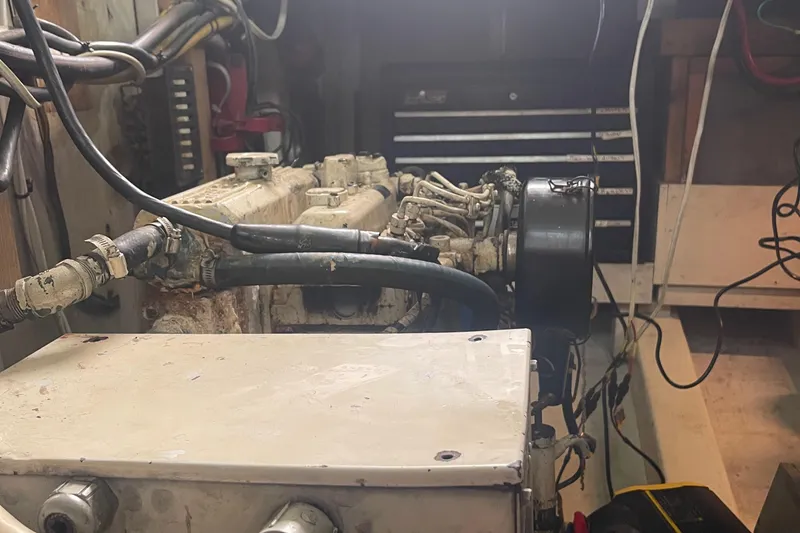 Slide: The Image of Engine room of a 2004 Custom Carolina 47 Alex Willis boat. - 28