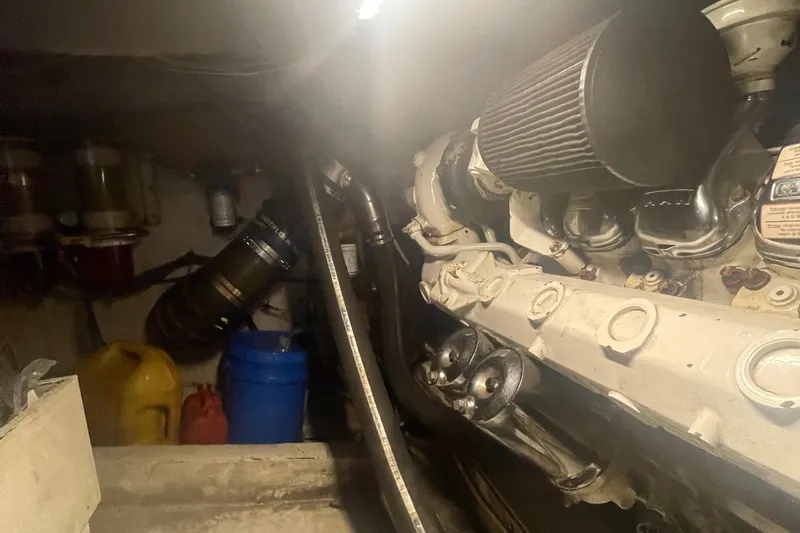 Slide: The Image of Engine room of a 2004 Custom Carolina 47 Alex Willis boat. - 30