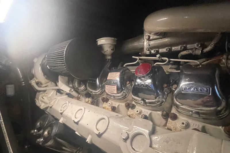 Slide: The Image of Engine of a 2004 Custom Carolina 47 Alex Willis boat. - 32