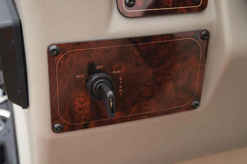 Slide: The Image of 2024 Sun Tracker Bass Buggy 18 DLX ignition switch panel. - 40