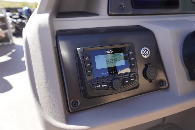 Slide: The Image of 2024 Sun Tracker Fishin' Barge 20 DLX dashboard with Wet Sounds audio system. - 8