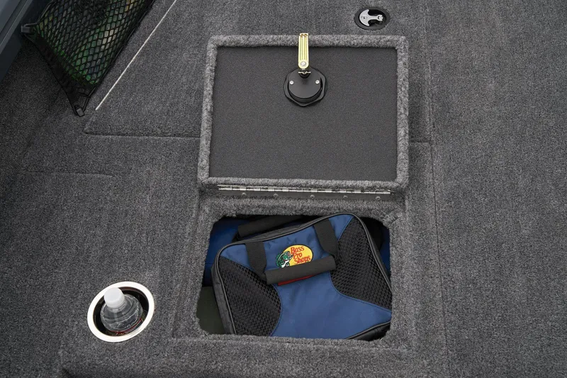 Slide: The Image of 2024 Ranger VS1782SC Angler boat storage compartment with gear and cup holder. - 29