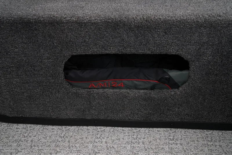 Slide: The Image of 2024 Ranger VS1782SC Angler boat storage compartment with visible gear. - 42