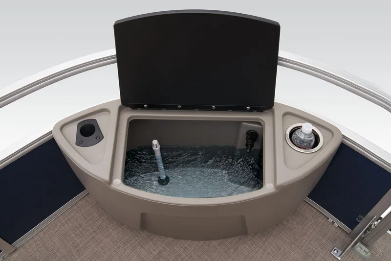 Slide: The Image of 2024 Sun Tracker Bass Buggy 18 DLX livewell with cup holders and water aeration system. - 23