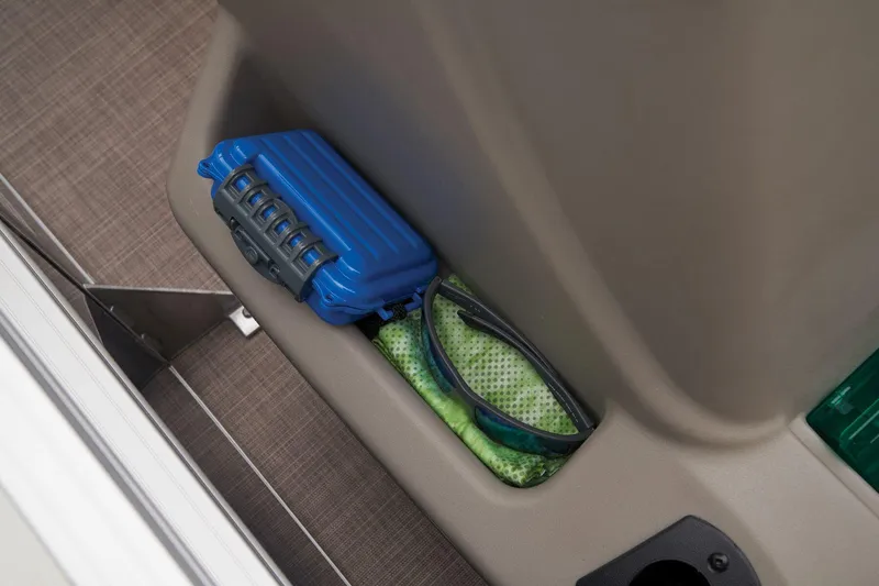 Slide: The Image of Storage compartment on the 2024 Sun Tracker Bass Buggy 18 DLX pontoon boat. - 32