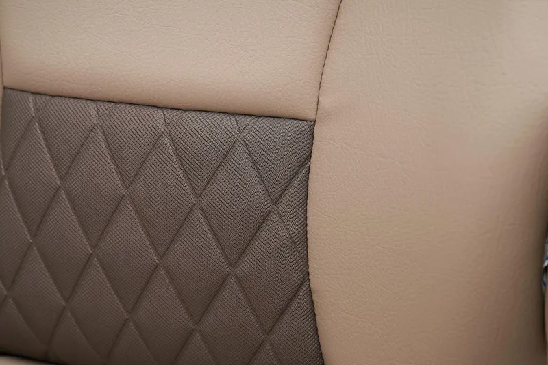 Slide: The Image of Close-up of 2024 Sun Tracker Bass Buggy 18 DLX seat with diamond-stitched upholstery. - 42