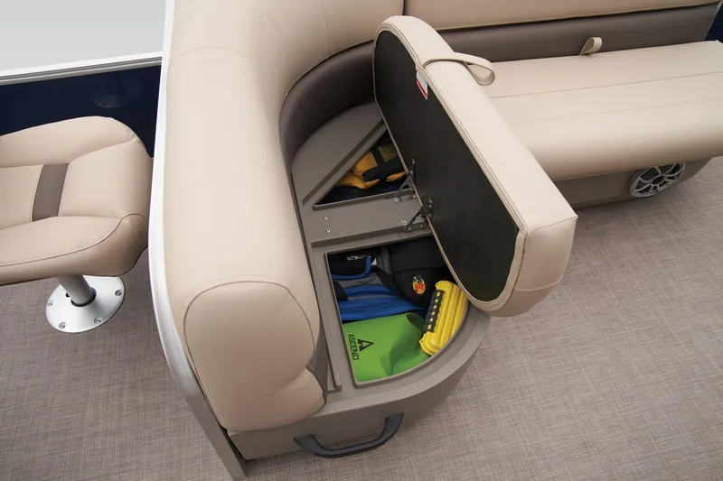 Slide: The Image of Sun Tracker Bass Buggy 18 DLX 2024 storage compartment with safety equipment. - 45