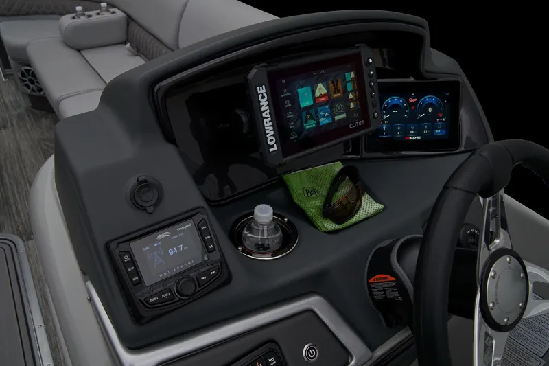 Slide: The Image of 2024 Ranger Reata 223FC boat dashboard with advanced navigation and control systems. - 22