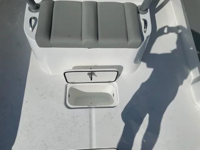 Slide: The Image of 2024 Cape Horn 31T boat interior with seating and storage compartments. - 11