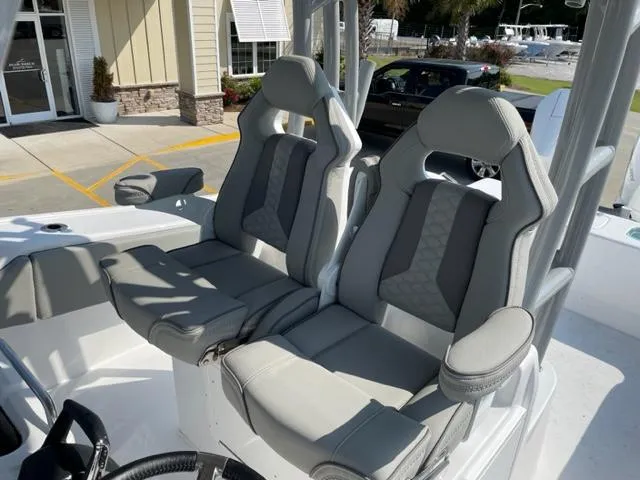 Slide: The Image of 2024 Cape Horn 31T boat with dual cushioned seats in the cockpit area. - 15