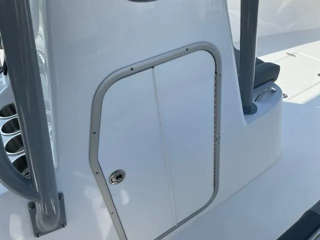 Slide: The Image of 2024 Cape Horn 31T boat console storage compartment. - 20