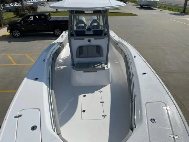 Slide: The Image of 2024 Cape Horn 31T center console boat with spacious deck and seating. - 33