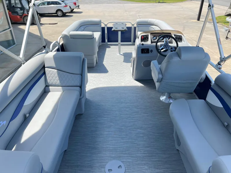 Slide: The Image of 2024 Bennington 20 SVSR pontoon boat interior with luxurious seating and modern helm. - 4