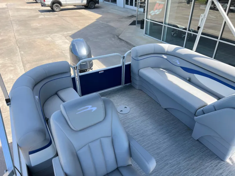 Slide: The Image of 2024 Bennington 20 SVSR pontoon boat with gray and blue seating. - 8