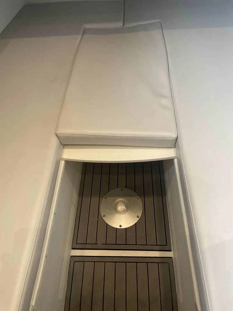 Slide: The Image of 2017 Mystic Powerboats M4200 interior seating and deck. - 19