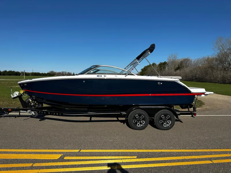 The Image of 2023 Four Winns H2 boat on a trailer, side view. - 0