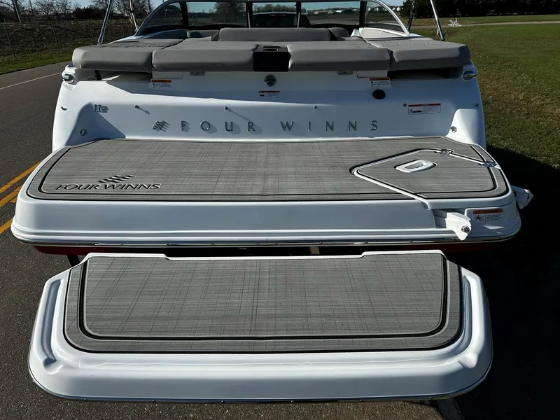 Slide: The Image of 2023 Four Winns H2 boat with open swim platform. - 4