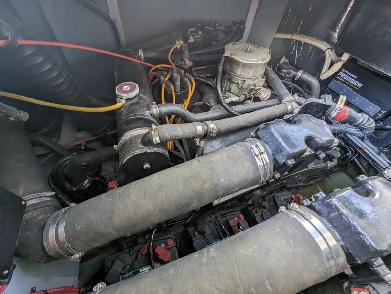 Slide: The Image of Engine compartment of a 1992 Sea Ray 330 Express Cruiser with visible fire extinguisher. - 17