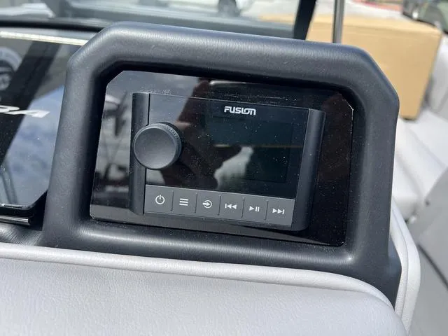 Slide: The Image of 2024 Moomba Craz boat dashboard with Fusion audio system. - 15