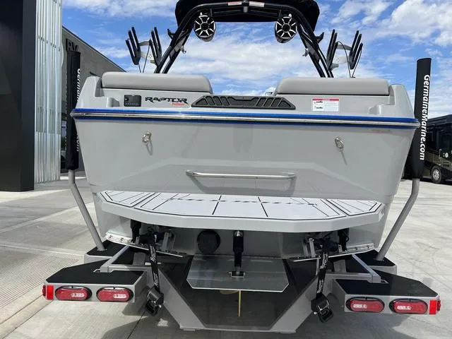 Slide: The Image of 2024 Moomba Craz boat rear view with Raptor engine and swim platform. - 8