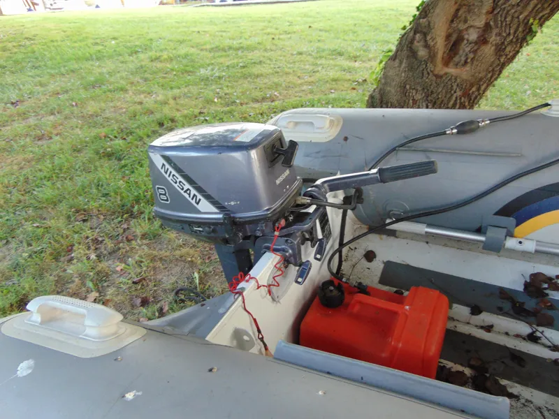 Slide: The Image of 2021 North Atlantic Inflatables DINK with Nissan outboard motor and fuel tank. - 3